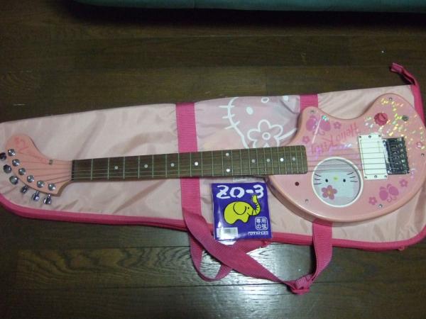 hello kitty guitar strap. This logic, however, escapes the Hello Kitty fanatic.