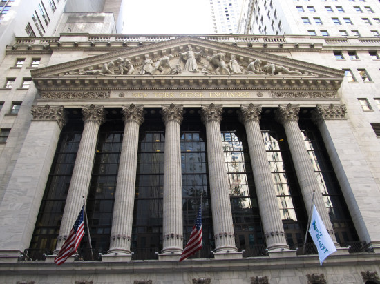 Stocks end the week mixed, but all indexes gained for the week and the dow moved into positive territory for the year