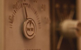 adjusting the thermostat