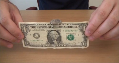 balance a quarter on a $1 bill