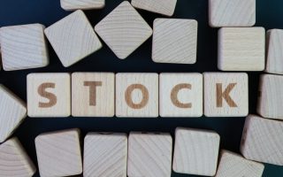 Wood blocks with the word "stock" written in the center.