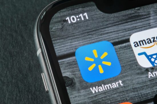 Picture of the Walmart app in the corner of a cell phone