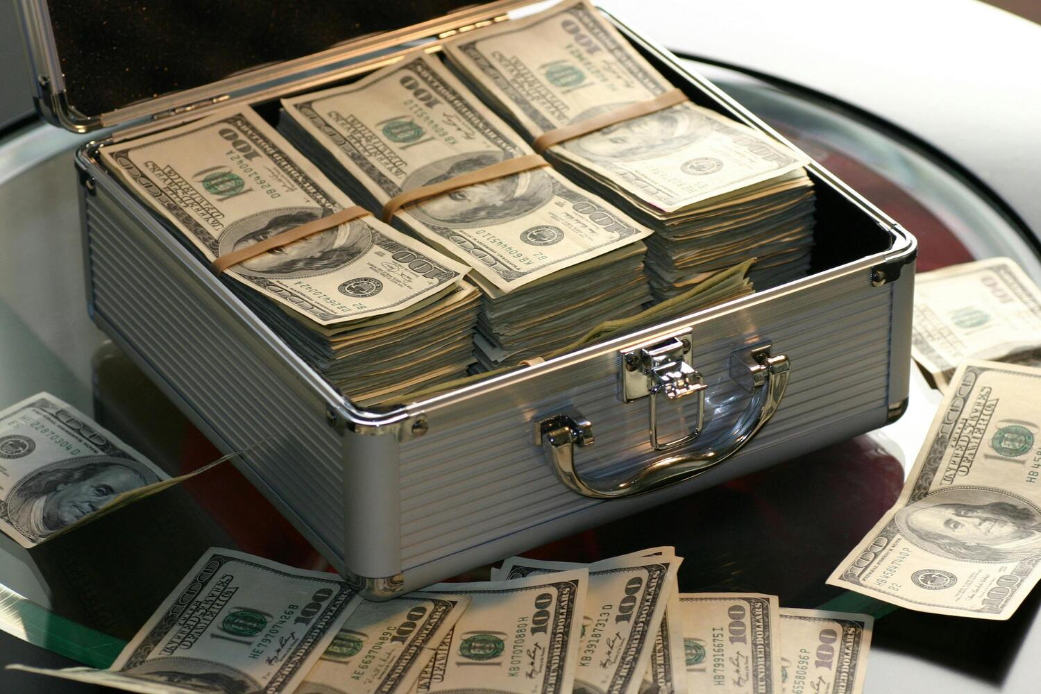 briefcase of money, money in a briefcase