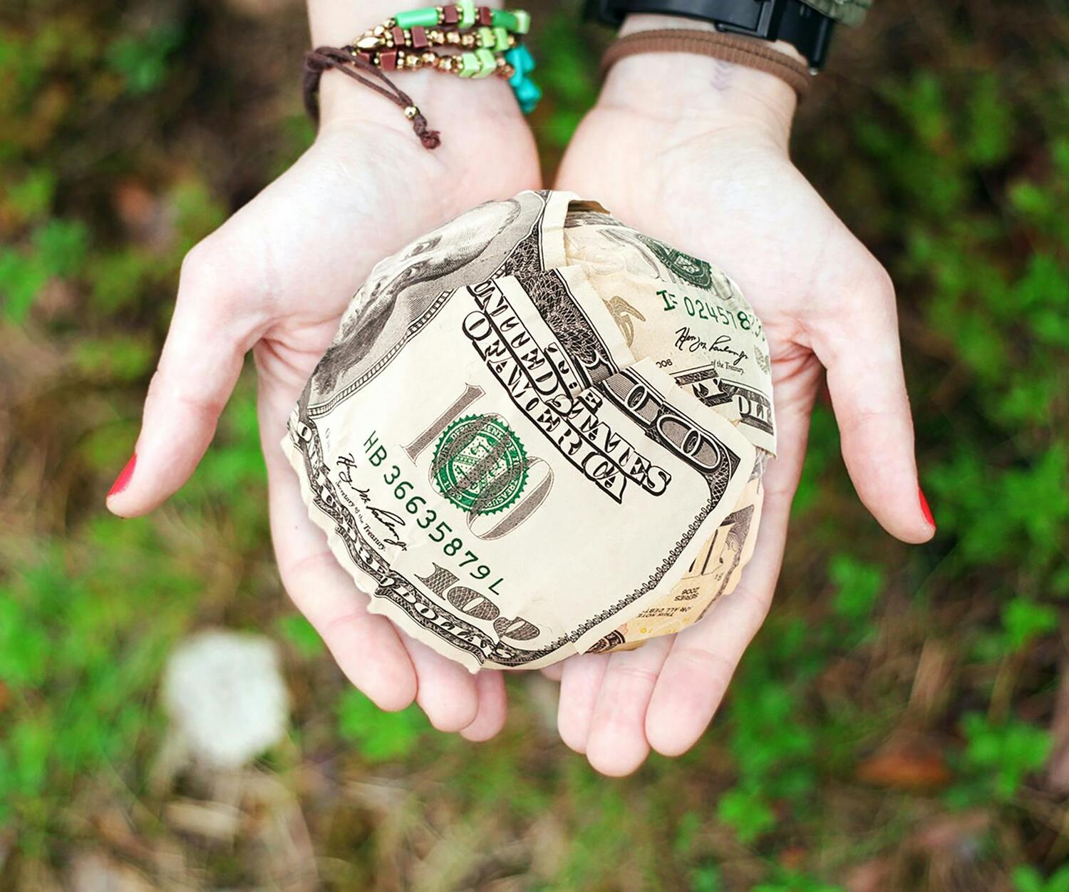 bundle of cash, wad of cash, ball of dollar bills