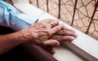 aging hands, elderly couple