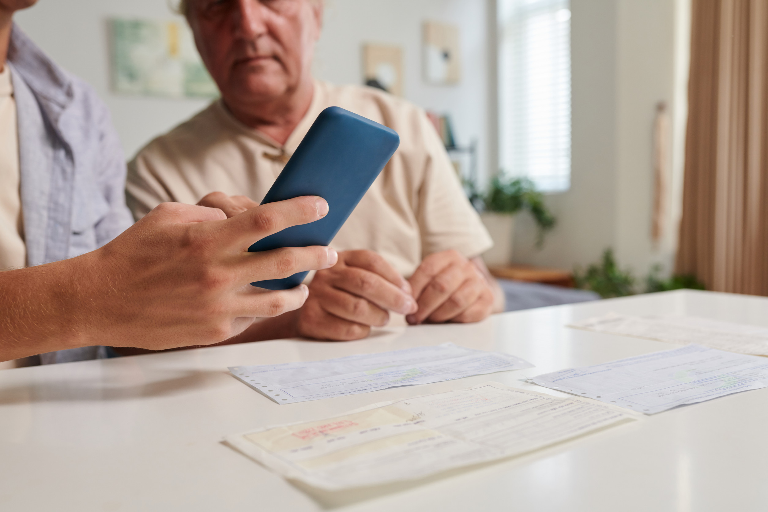 Senior using banking apps