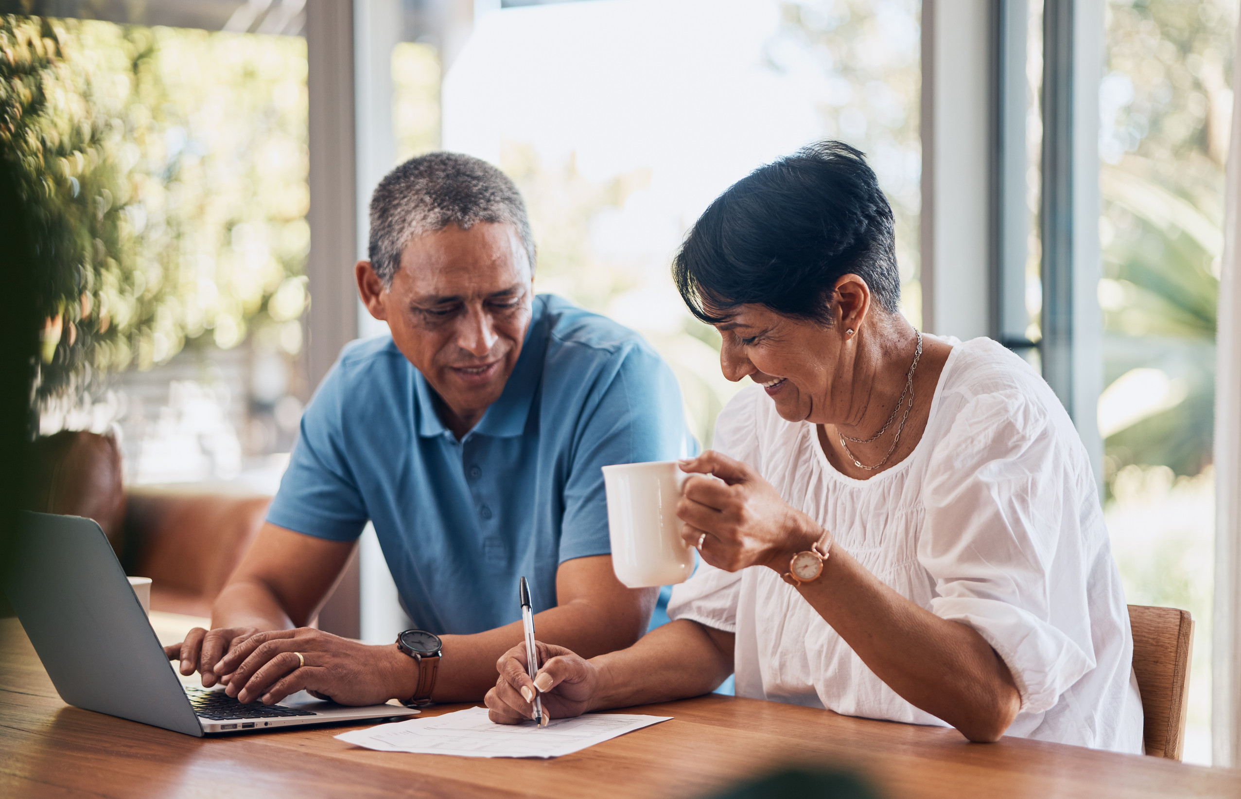 senior couple discussing cash management