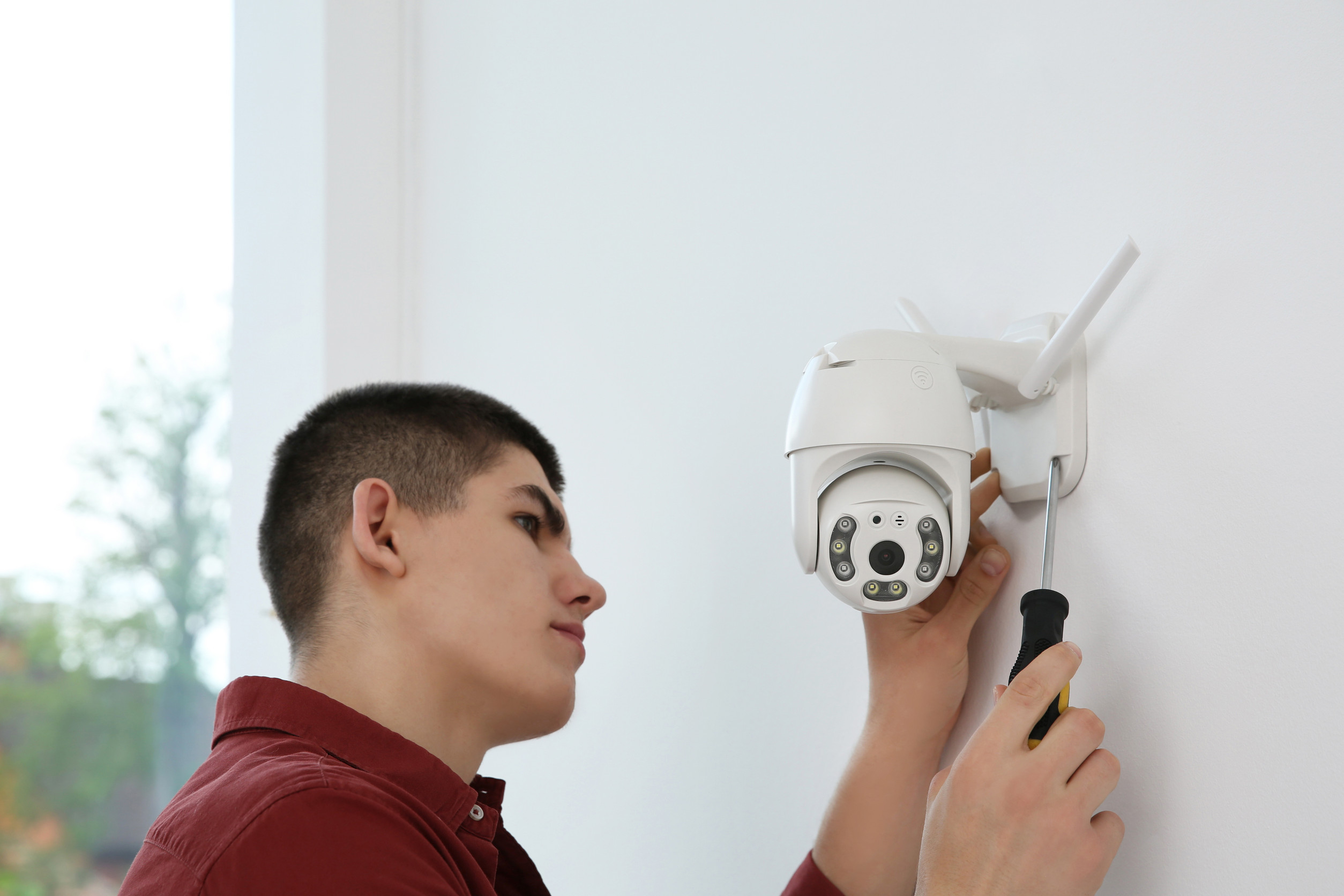 adult children installing cameras