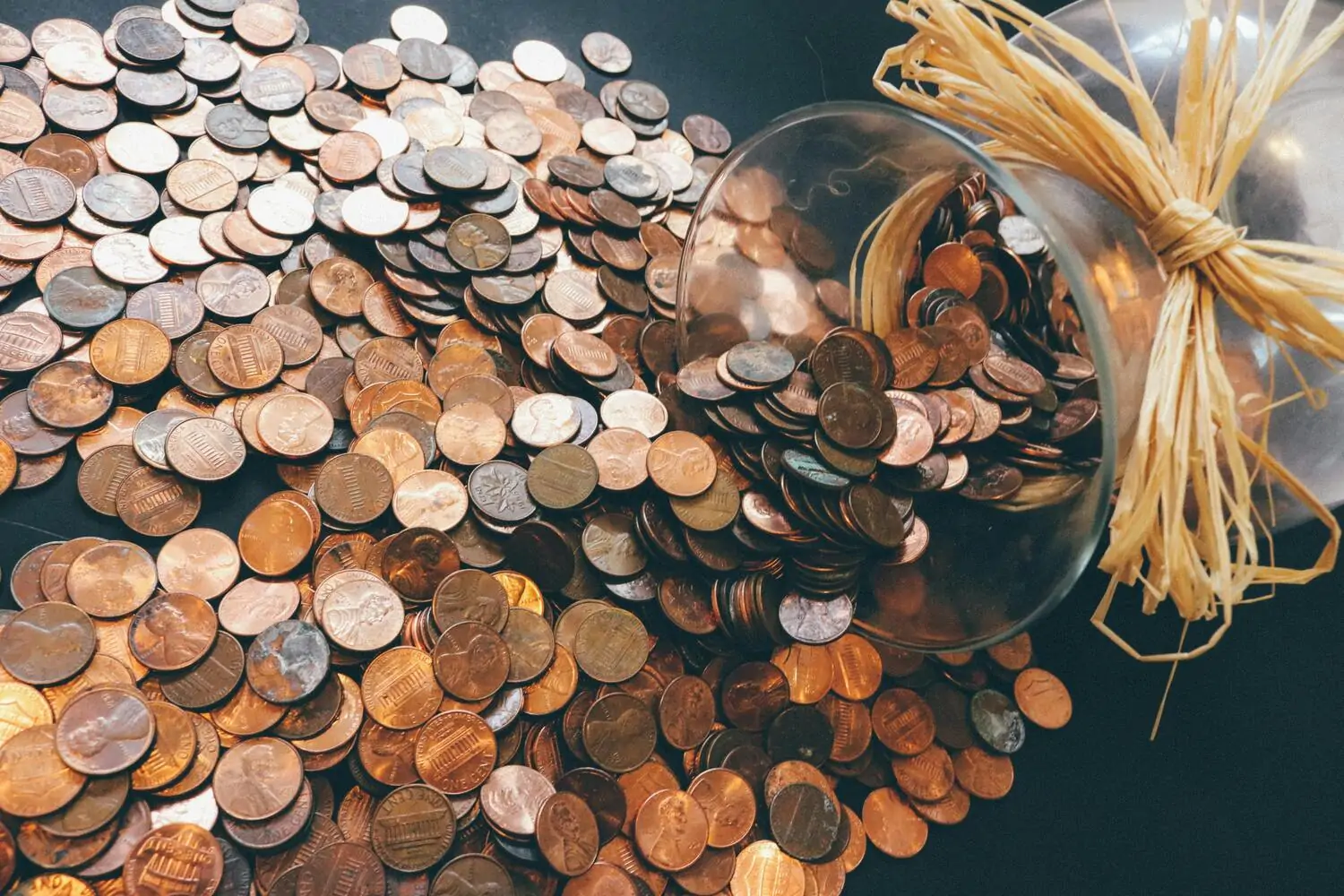 pile of change, pennies and dimes
